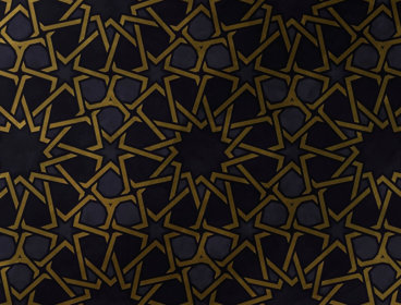 Symmetrical pattern of gold stars against a dark background.