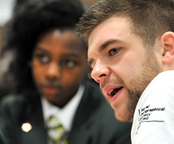 Professional Ambassador with a student