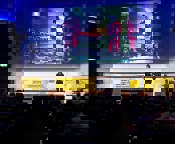 Esther Horvath presenting in Ondaatje Theatre.