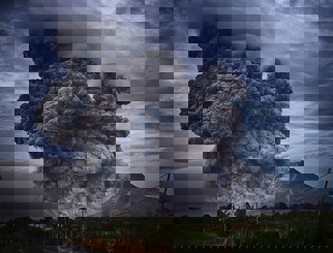 An ash plume emerging from a volcano