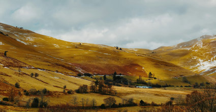 View Over Hills With Light Snow