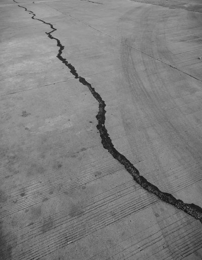 A fault line in a grey road