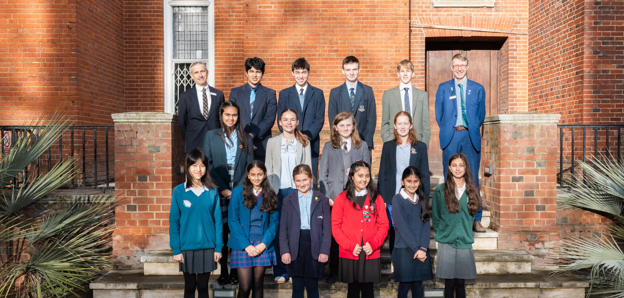 Group of 14 school students standing on Society's Terrace steps