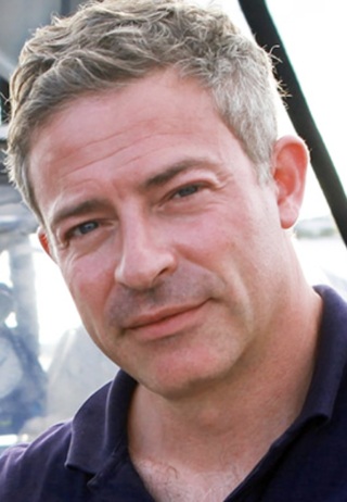 Headshot of Oliver Steeds.