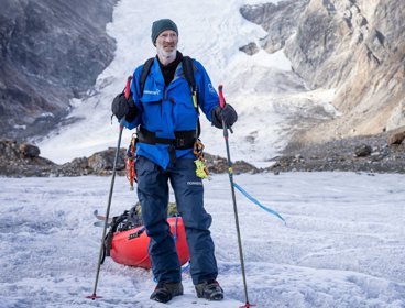 Borge Ousland in northwinds trekking with kayak.