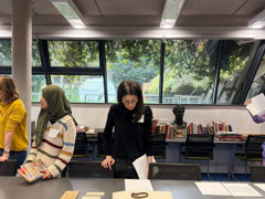 People looking at Collections during Culture& workshop