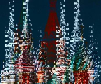 Saint Basil Cathedral, Russia, photographed at night showing the colours on its ornate roofs