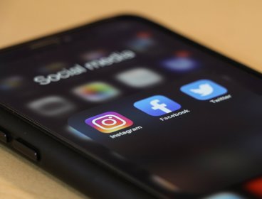 Smartphone showing Facebook, Instagram and Twitter apps