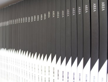 Shelf stacked with copies of the Royal Geographical Society's Area journal