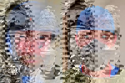 Two images of Dr Alex Brazier side by side. One of the images shows him on an expedition in Antarctica while the other one shows him in PPE while working in ICU.