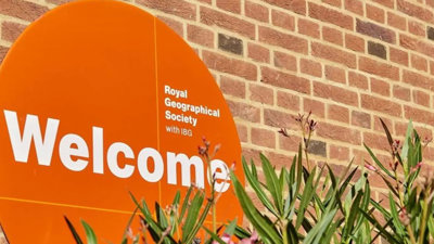Royal Geographical Society with IBG sign stating welcome.