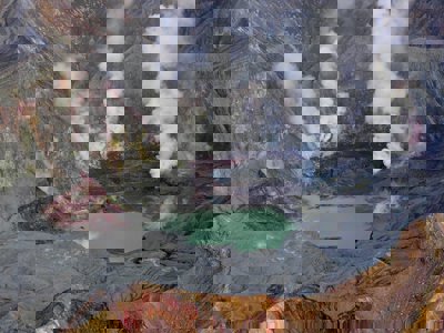 An aerial view of the White Island volcano crater